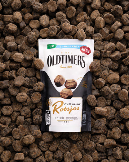 Oldtimers Zoute Salmiak Rotsjes suikervrij vegan snoep tussen losse salmiakrotsjes.